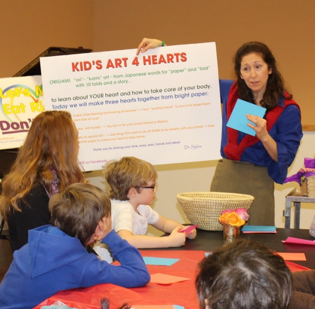 Sylvia leading Kids Art 4 Hearts Program